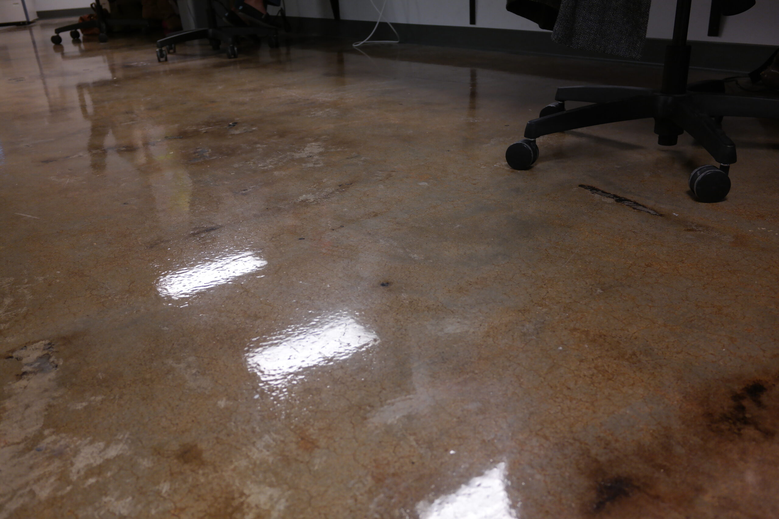 PlexiGlaze #4 provides protection to the floor while showcasing its imperfections, upon the church's request.