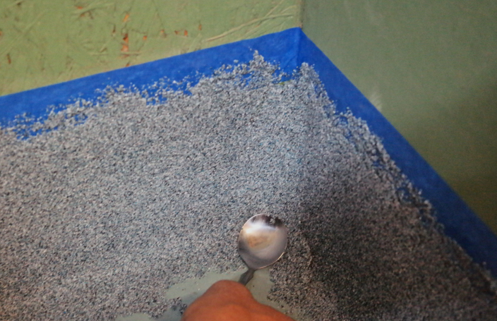 The soup spoon should end at the bottom of the cove base corner, towards the floor