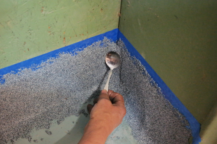 Step 4: place the soup spoon at a 75° degree angle onto the top corner of the cove base